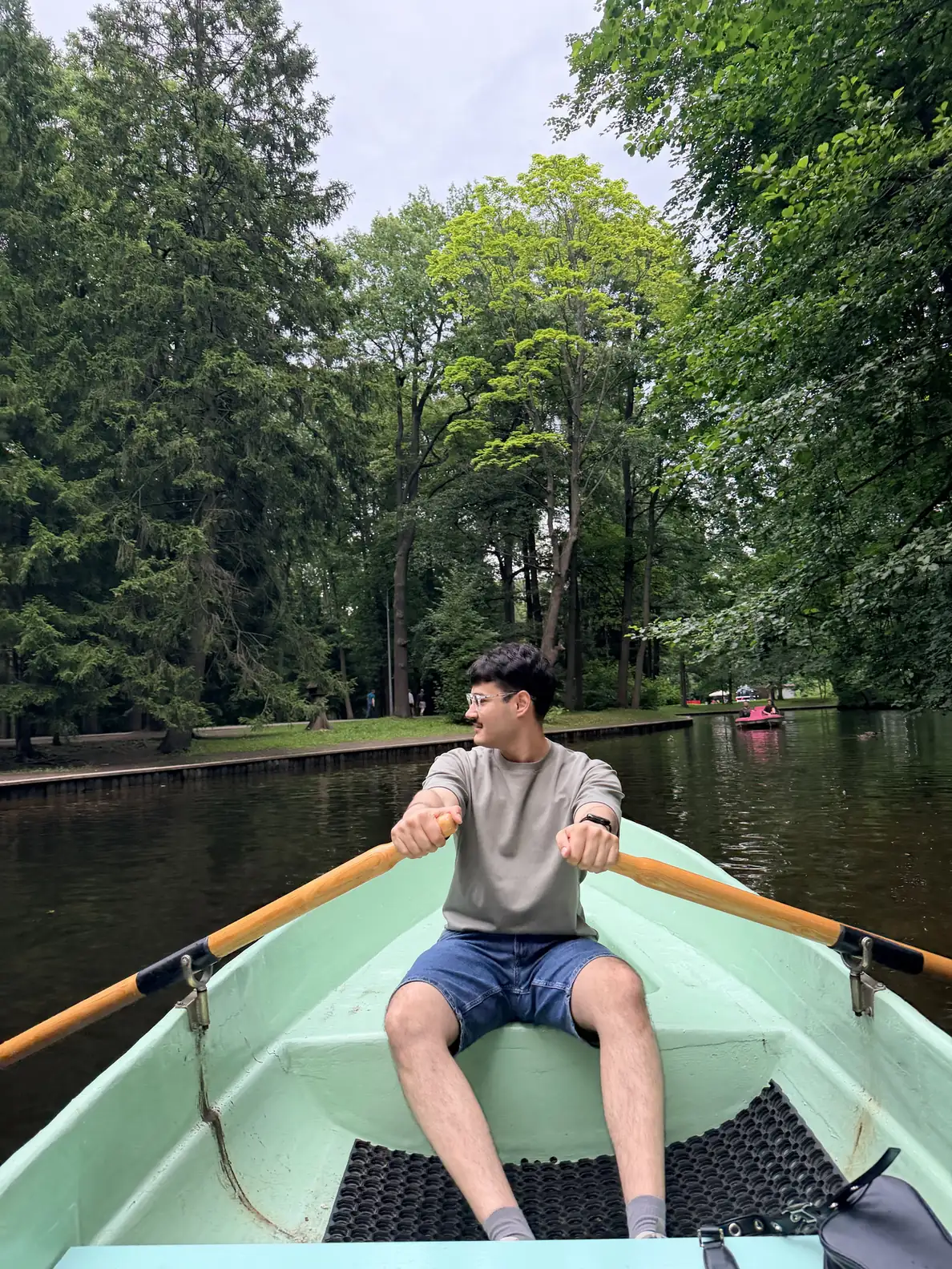 Amir rowing a boat