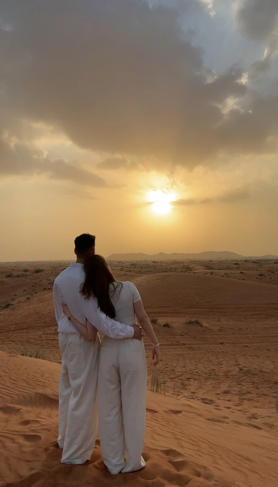 Amir and Kate watching the sunset