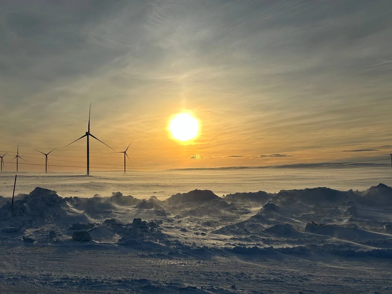 Sun over the frozen coast in Teriberka